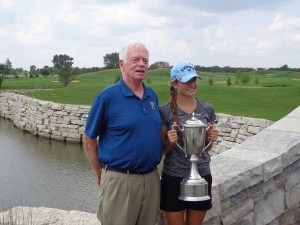 DSC02913 Jim McWethy with Emily Collins on bridge with trophy pic 1 DS